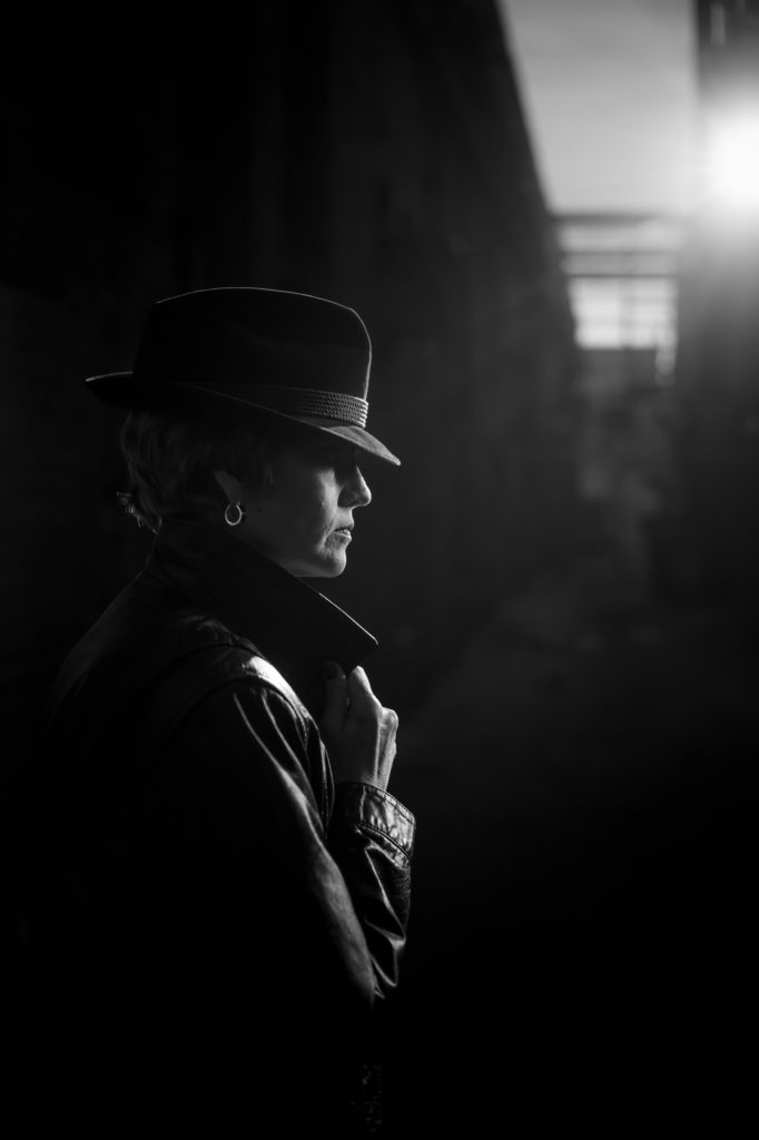 Black & White film noir detective portrait